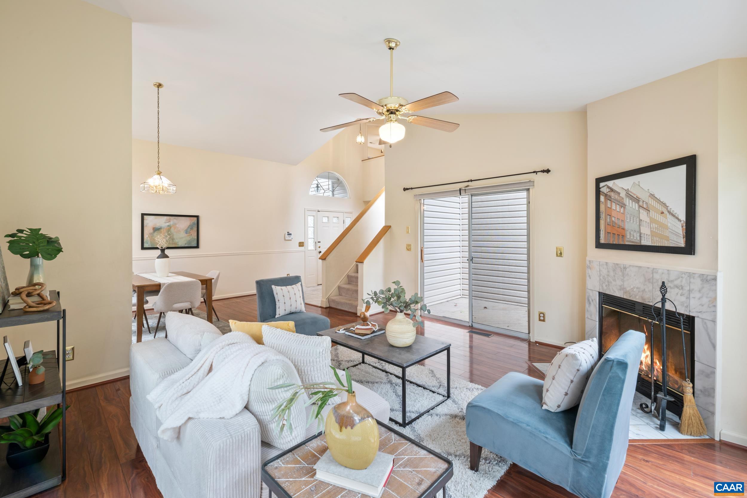 183 Rustling Oaks Way Ruckersville, VA 22968 - Photo 12 of 52 a living room with furniture a fireplace and wooden floor