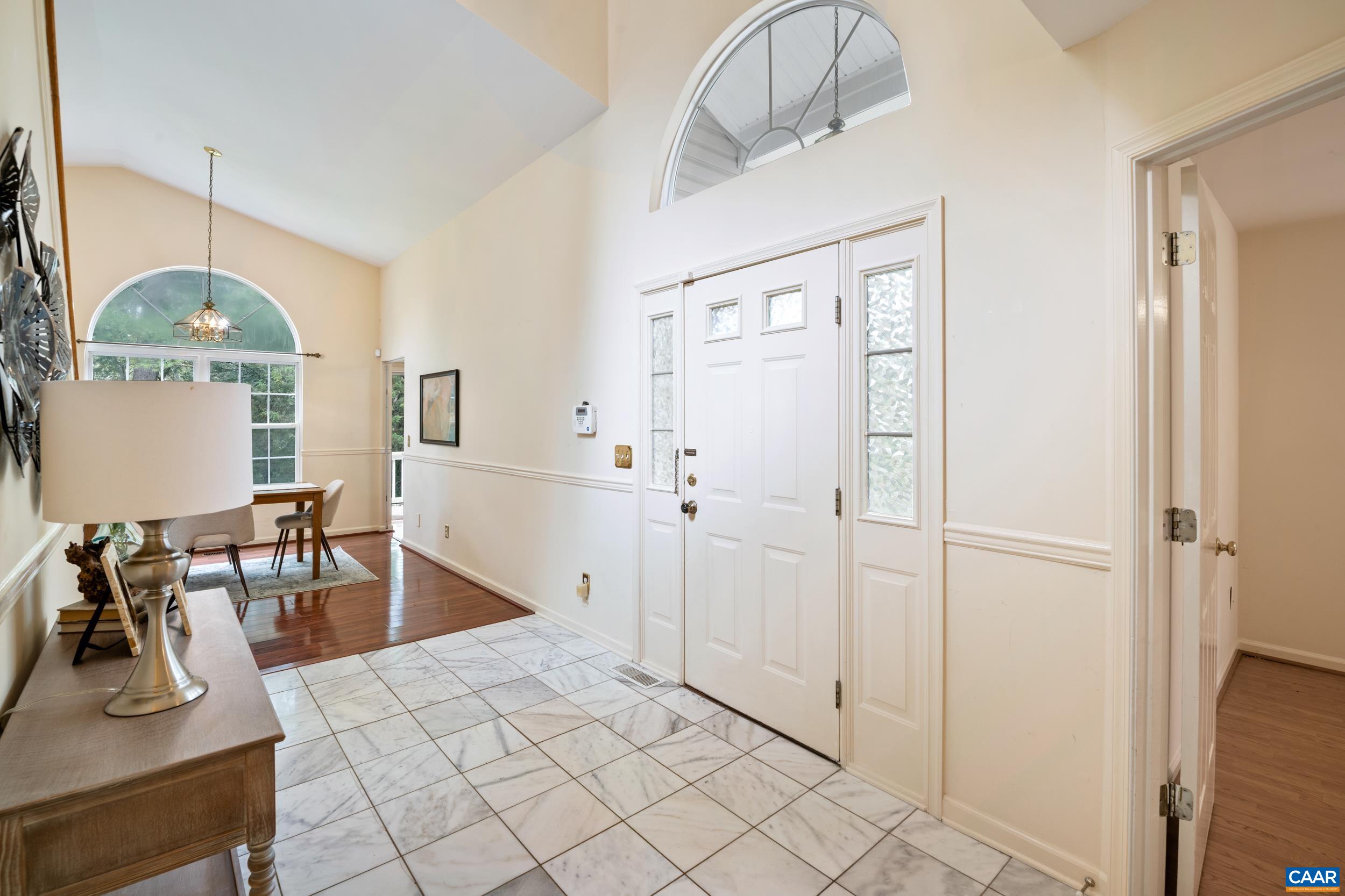 183 Rustling Oaks Way Ruckersville, VA 22968 - Photo 13 of 52 a view of a livingroom with furniture and a window