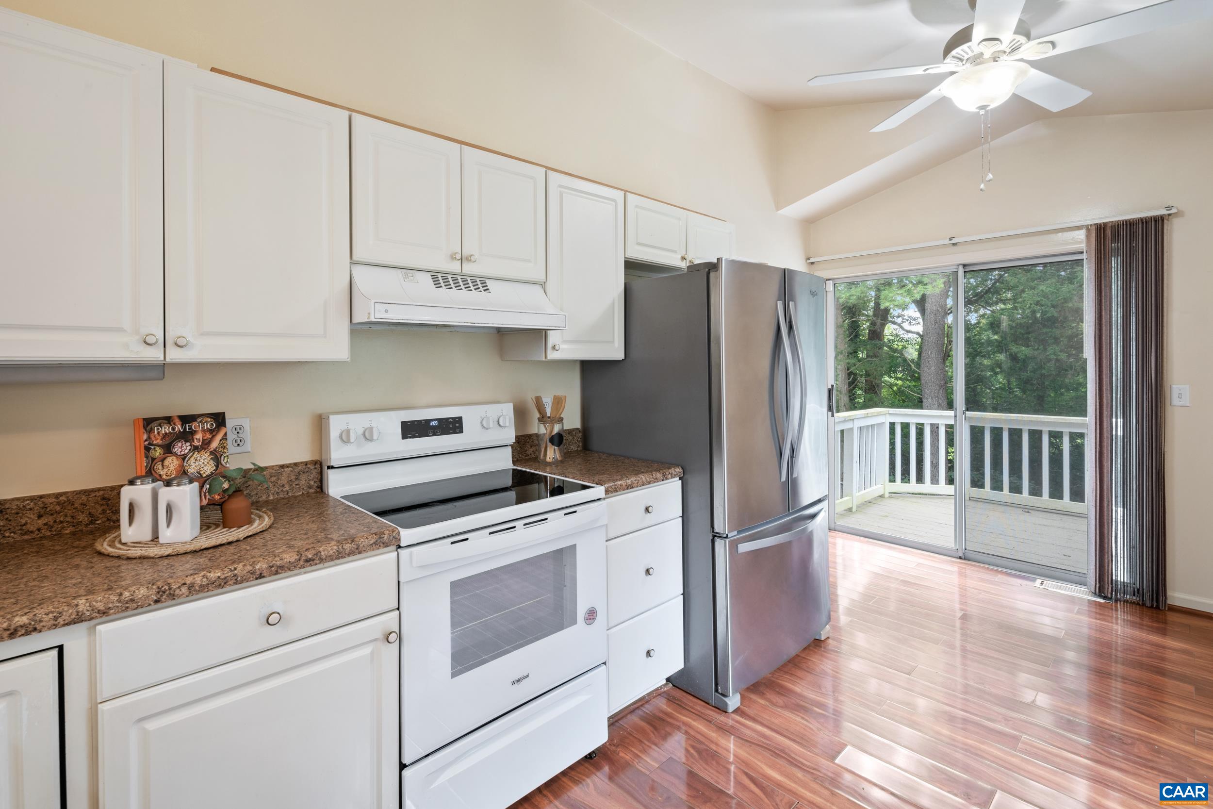 183 Rustling Oaks Way Ruckersville, VA 22968 - Photo 18 of 52 a kitchen with a stove a refrigerator and a sink