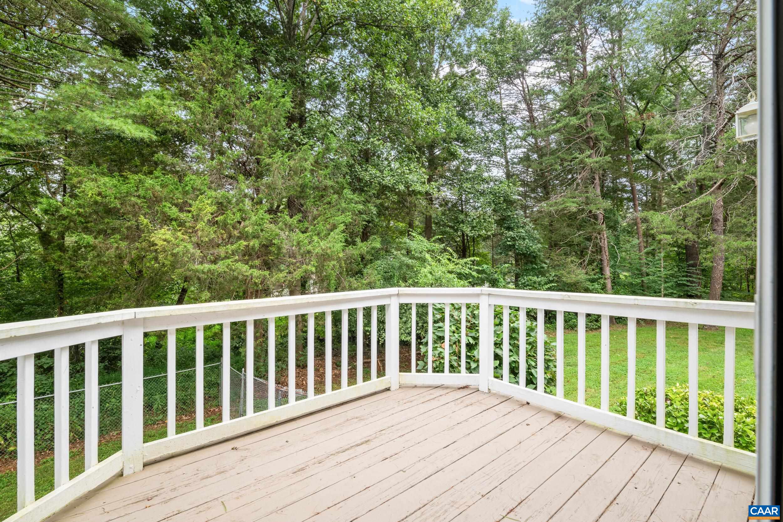 183 Rustling Oaks Way Ruckersville, VA 22968 - Photo 21 of 52 a balcony with wooden floor and fence