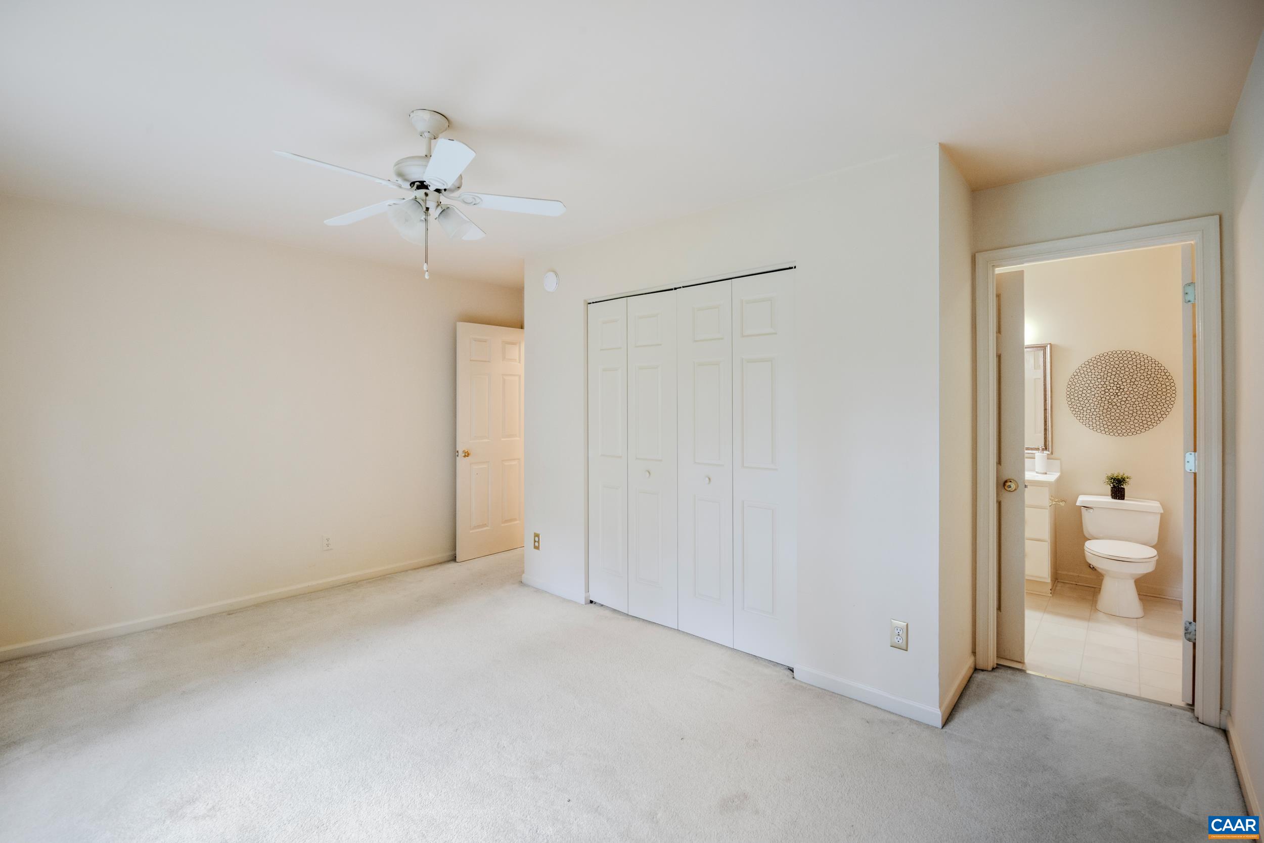 183 Rustling Oaks Way Ruckersville, VA 22968 - Photo 25 of 52 wooden floor in an empty room and a bathroom