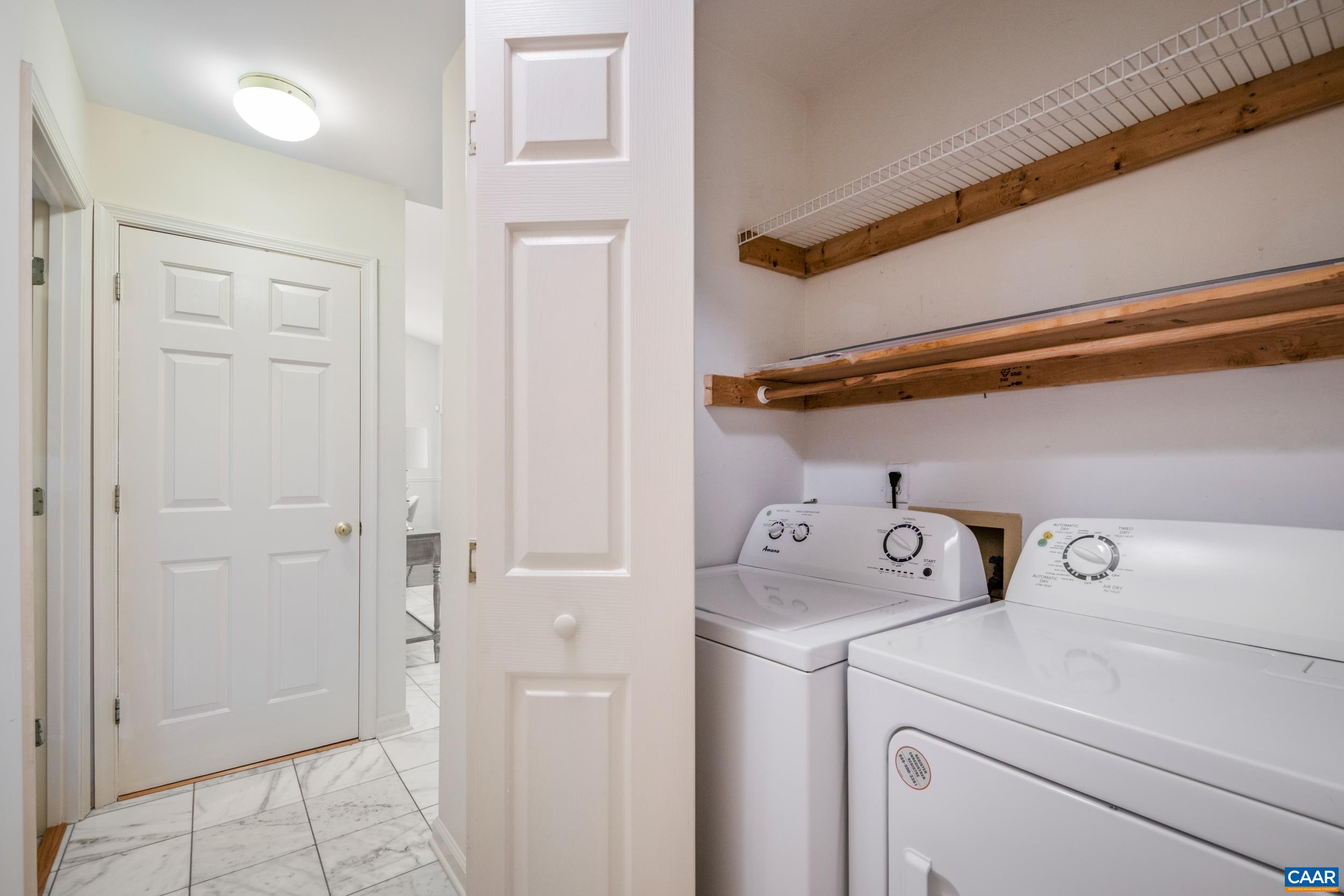 183 Rustling Oaks Way Ruckersville, VA 22968 - Photo 27 of 52 a utility room with dryer and washer