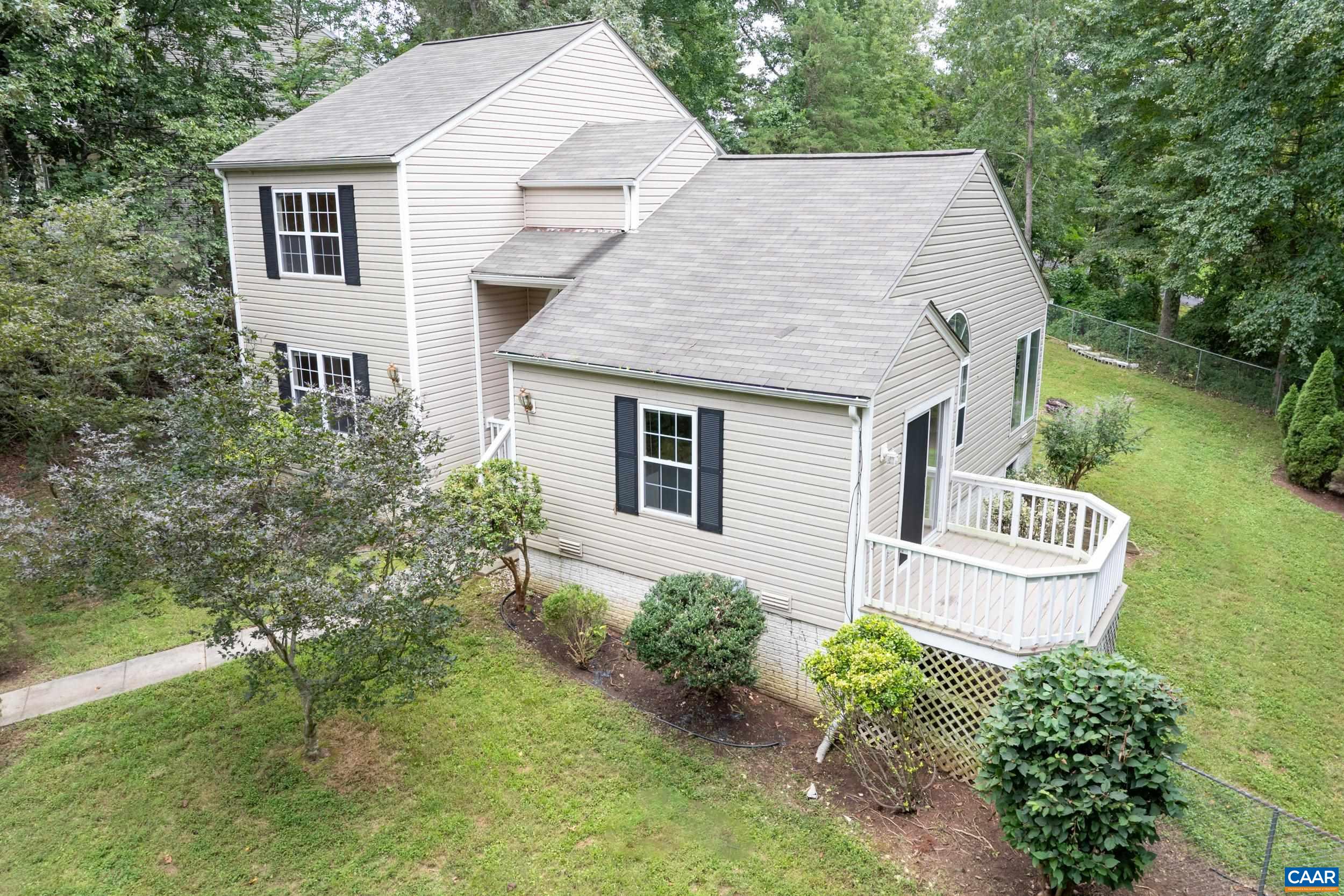 183 Rustling Oaks Way Ruckersville, VA 22968 - Photo 3 of 52 an aerial view of a house with a yard and potted plants