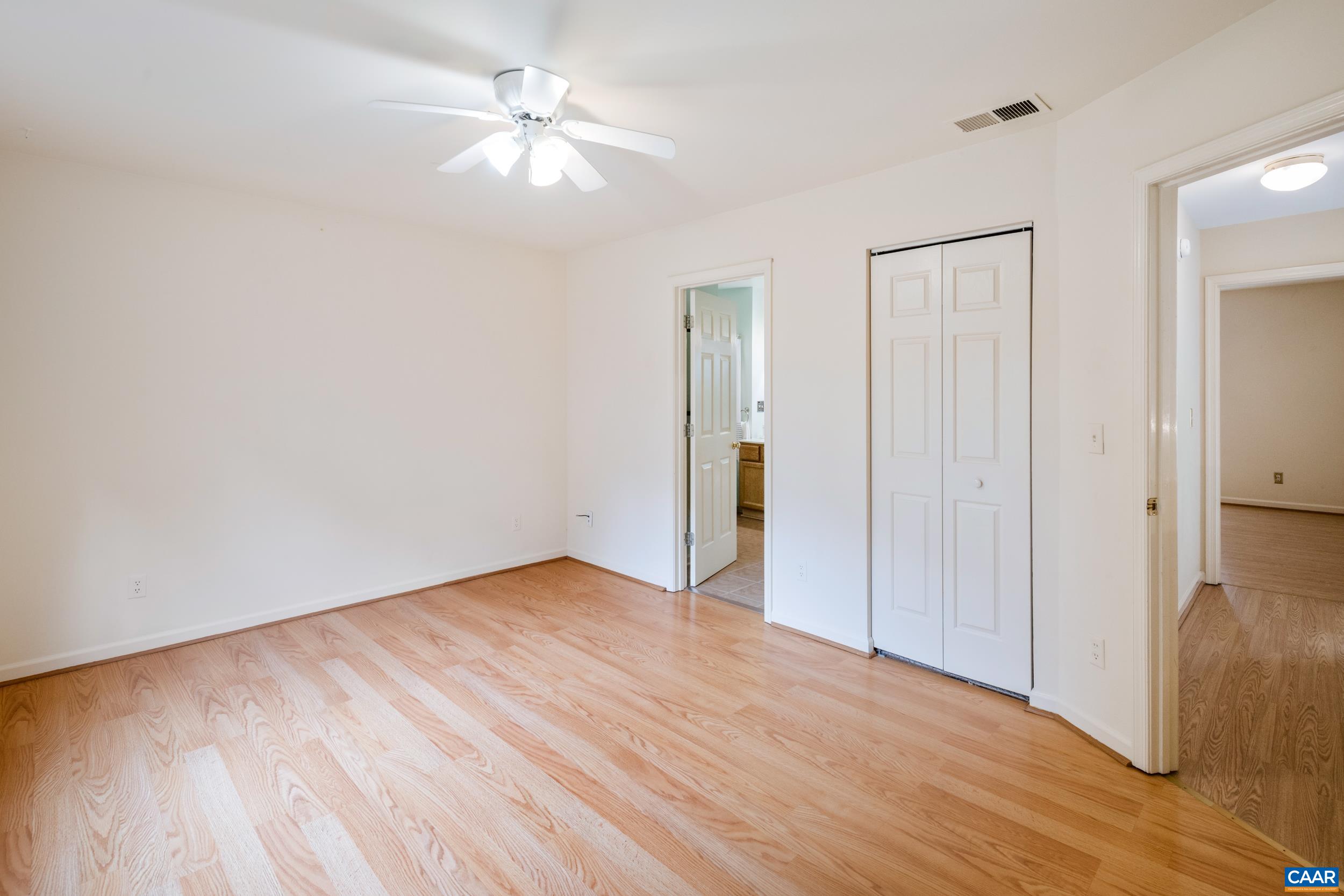183 Rustling Oaks Way Ruckersville, VA 22968 - Photo 40 of 52 wooden floor in an empty room