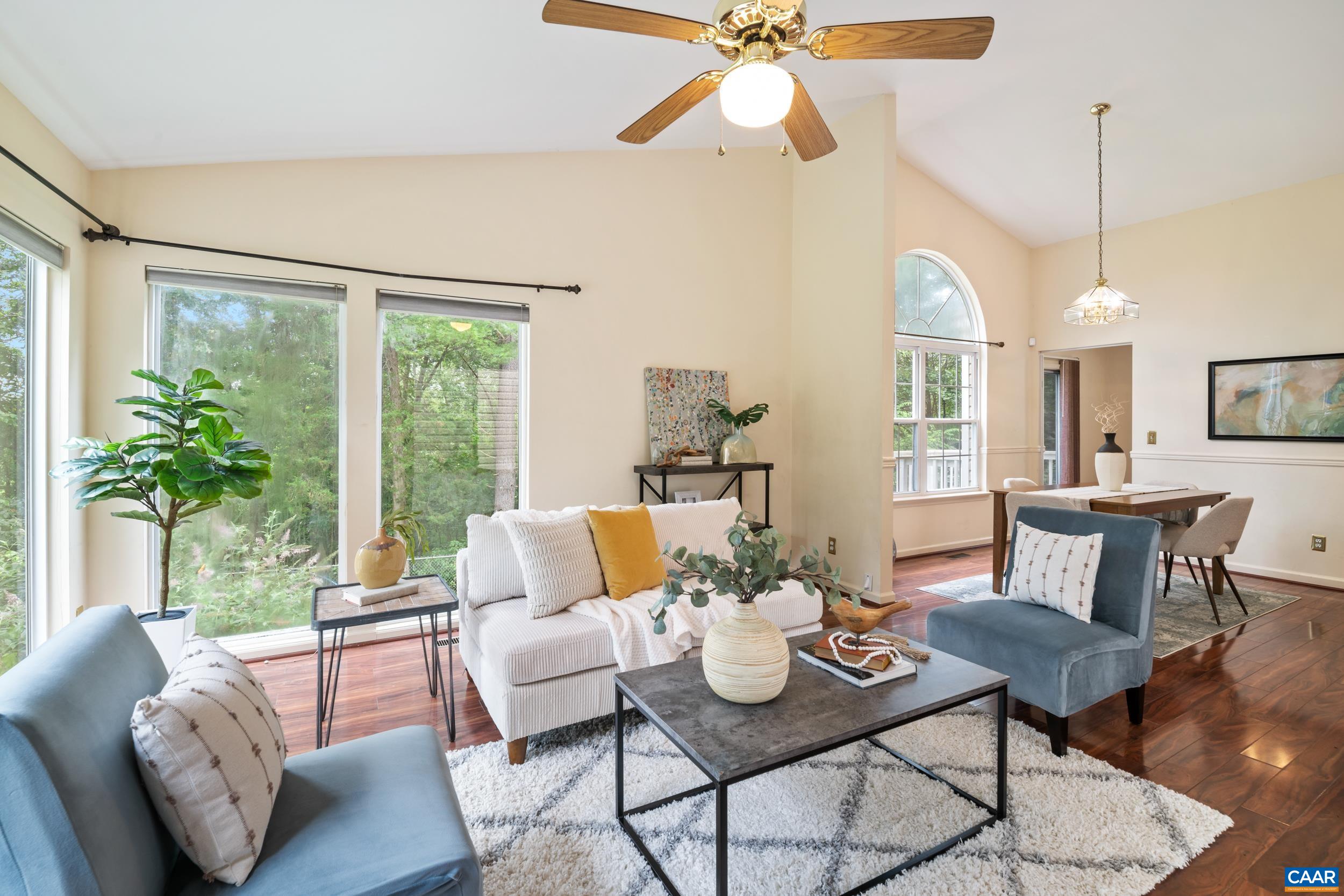 183 Rustling Oaks Way Ruckersville, VA 22968 - Photo 7 of 52 a living room with furniture and a large window