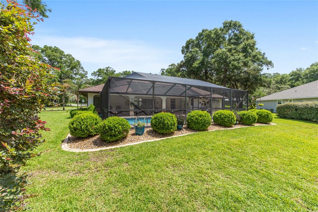 18825 Southwest 93rd Loop Dunnellon, FL 34432 - Photo 60 of 85 a view of a garden with a house