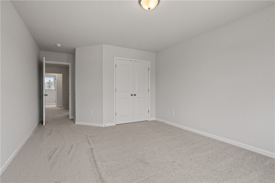 555 Hydrangea Street, Unit LOT 47 Seneca, SC 29678 - Photo 28 of 38 An inviting room offering soft carpeted floors and a double-door closet.