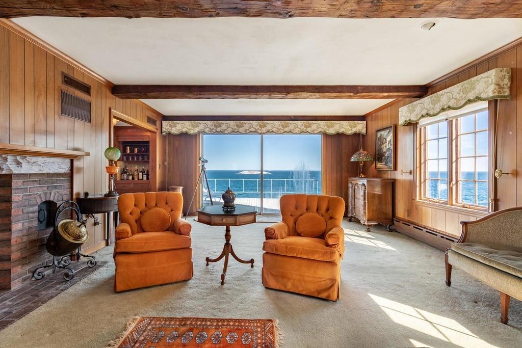 14 Hathaway Road Marblehead, MA 01945 - Photo 9 of 26 a living room with furniture a rug and a large window