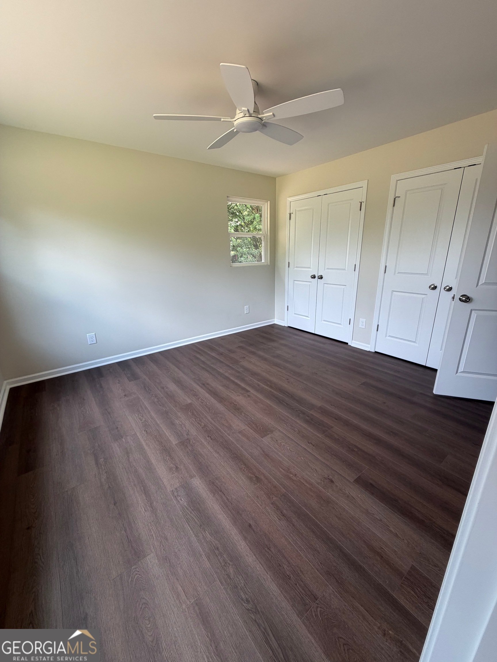 2809 Jones Road Sandersville, GA 31082 - Photo 25 of 31 wooden floor in an empty room