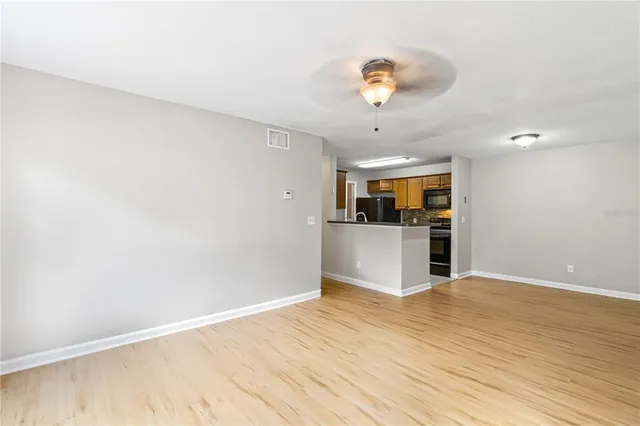 a view of kitchen with wooden floor