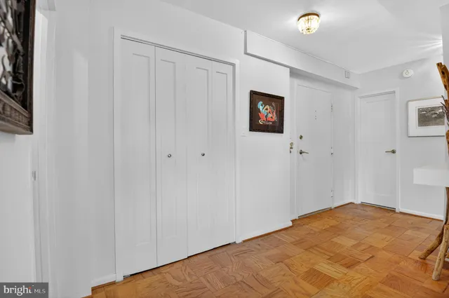 a view of a room with a flat screen tv