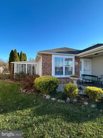 a view of a house with a garden