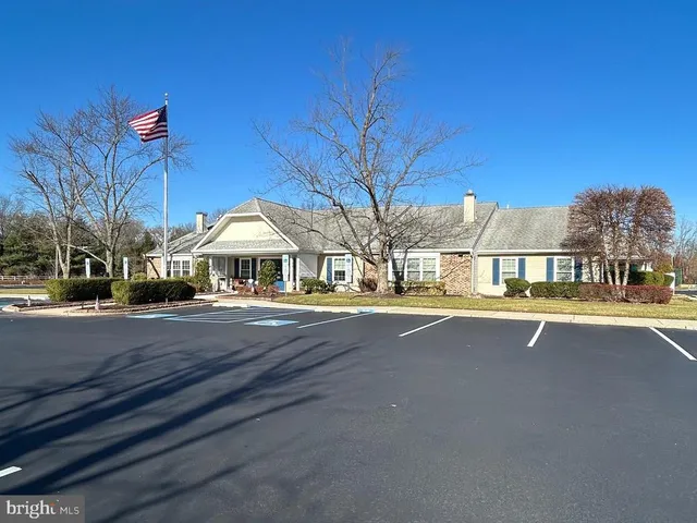 a view of multiple houses with a street