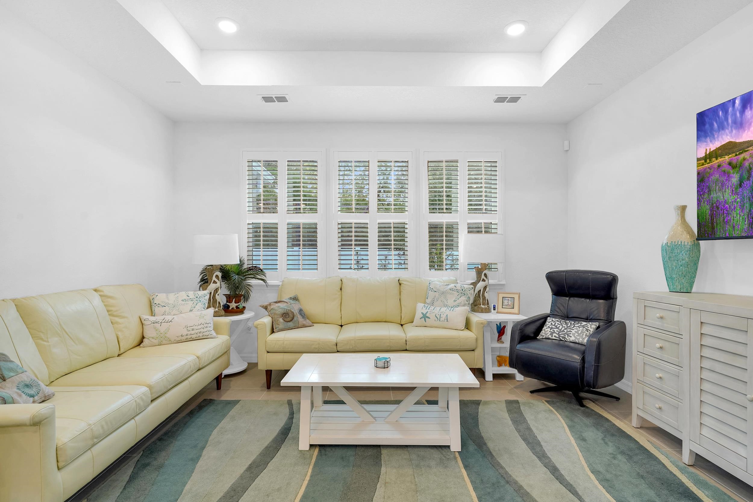 127 Shell Crk Court St. Augustine, FL 32086 - Photo 12 of 37 a living room with furniture and a large window