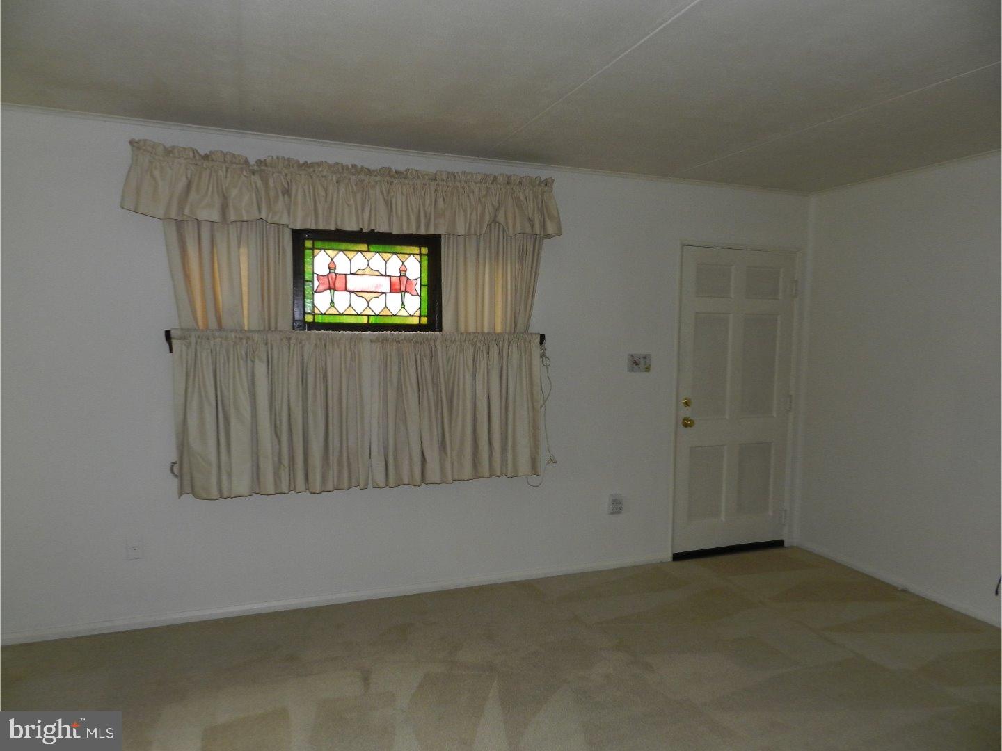 113 Gable Road Paoli, PA 19301 - Photo 5 of 17 an empty room with windows