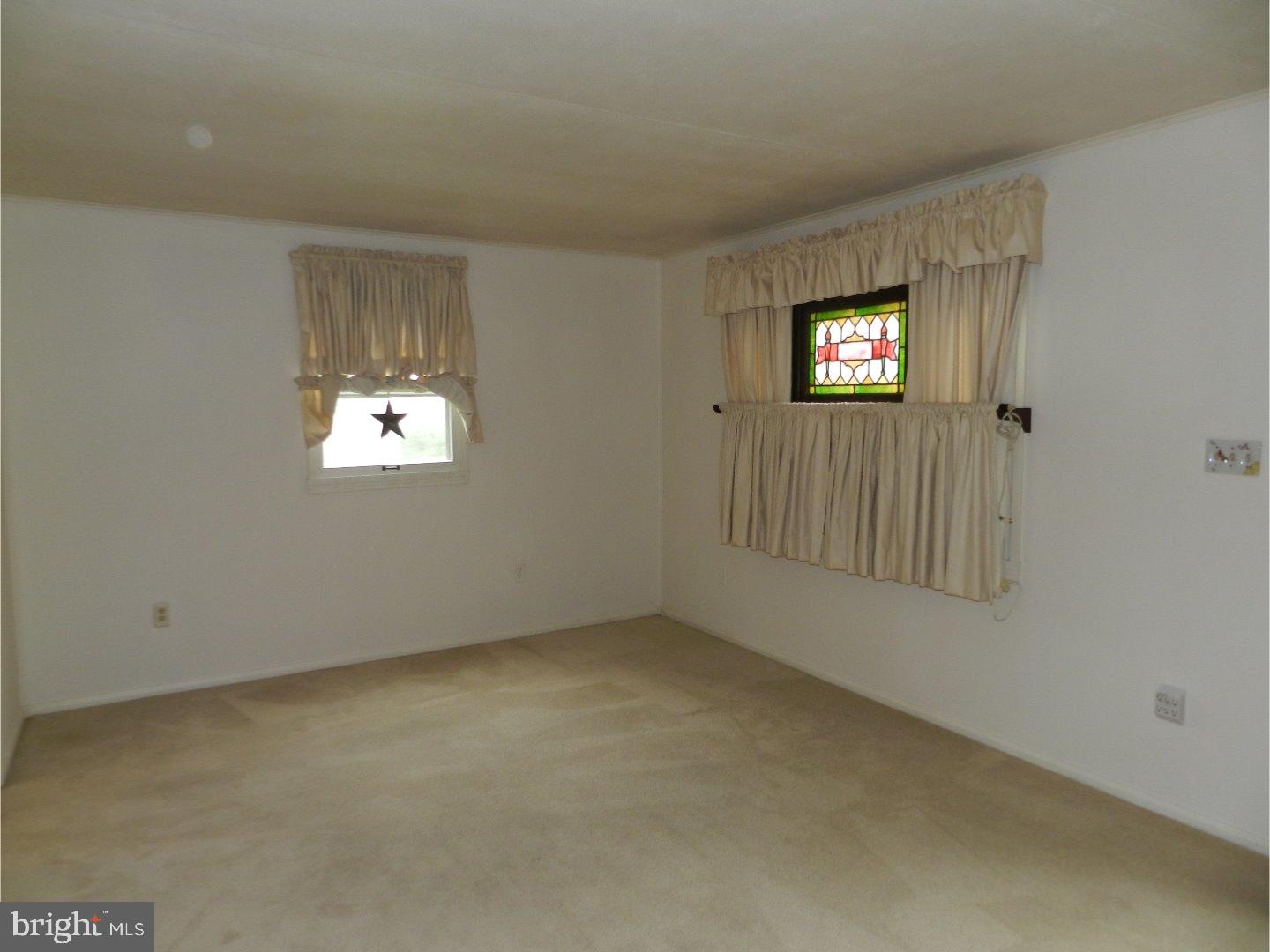 113 Gable Road Paoli, PA 19301 - Photo 8 of 17 an empty room with windows