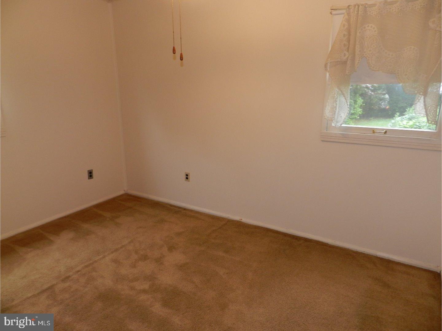 113 Gable Road Paoli, PA 19301 - Photo 10 of 17 an empty room with a window