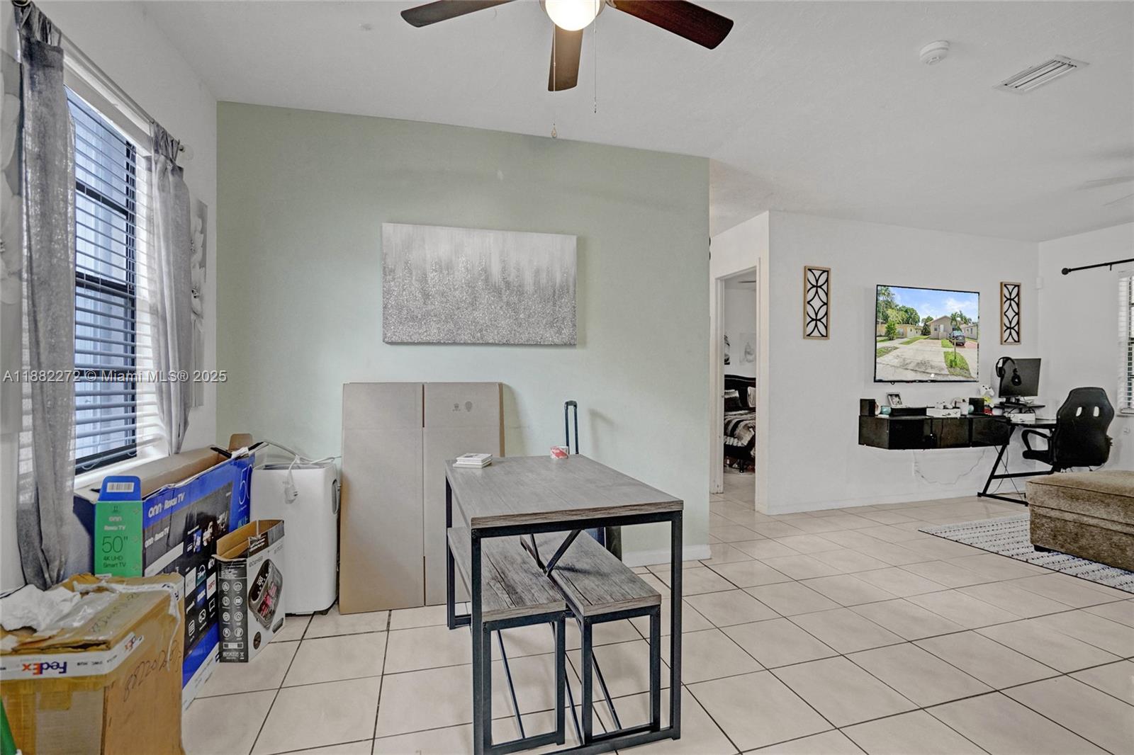 5606 Hayes Street, Unit 2 Hollywood, FL 33021 - Photo 15 of 20 a view of a livingroom and dining room
