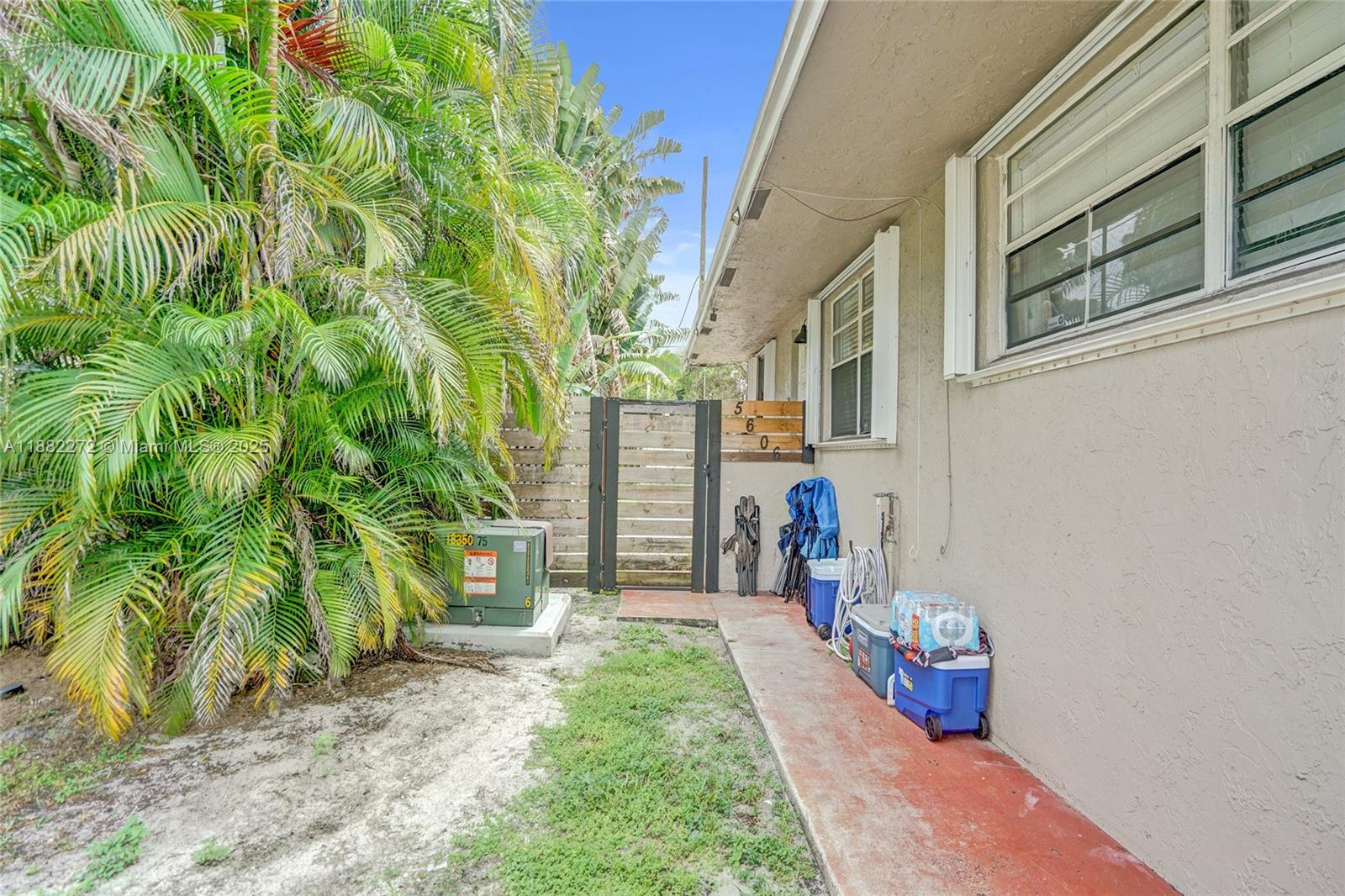 5606 Hayes Street, Unit 2 Hollywood, FL 33021 - Photo 19 of 20 a view of a back yard of the house
