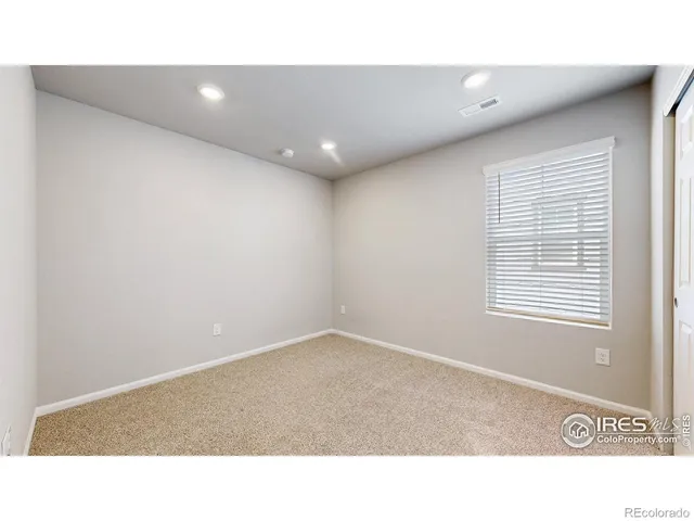 a black and white photo of a living room