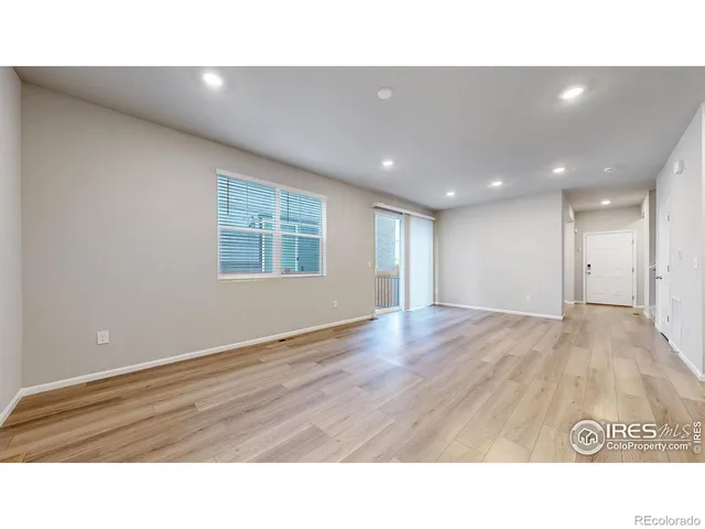 a open kitchen with kitchen island granite countertop a sink stainless steel appliances and cabinets