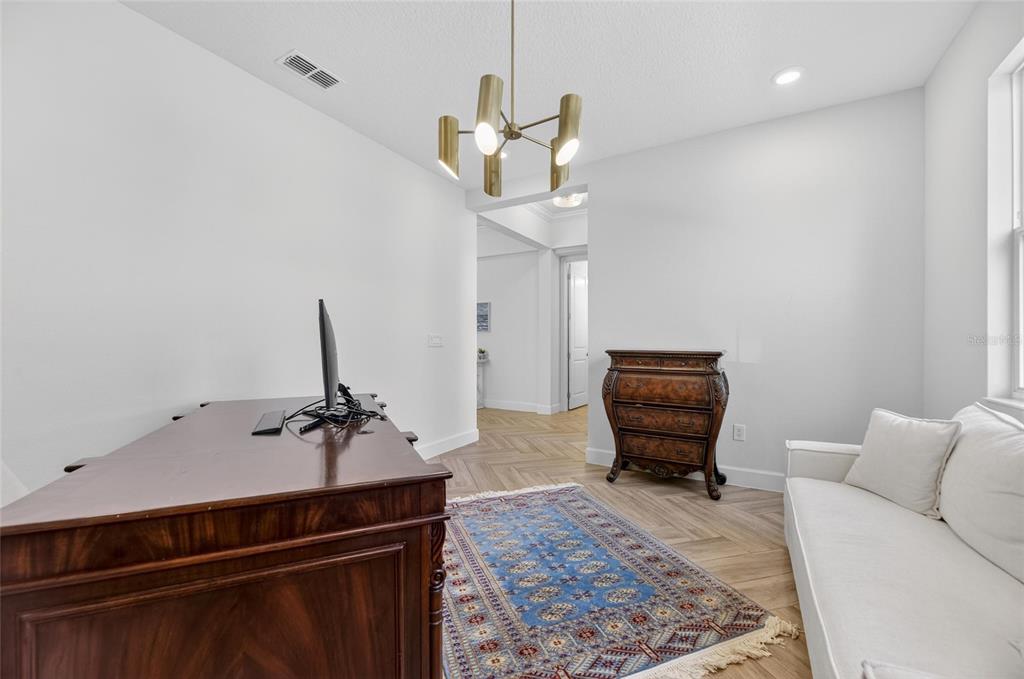 914 Signet Drive Apollo Beach, FL 33572 - Photo 15 of 100 a living room with furniture and a rug