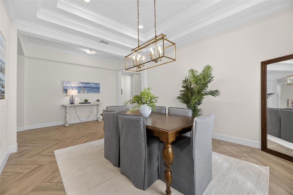914 Signet Drive Apollo Beach, FL 33572 - Photo 16 of 100 a view of a dining room with furniture window and wooden floor