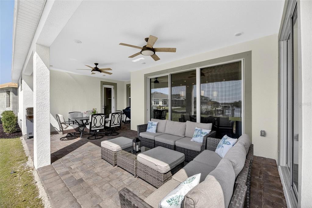 914 Signet Drive Apollo Beach, FL 33572 - Photo 53 of 100 a living room with furniture and a large window