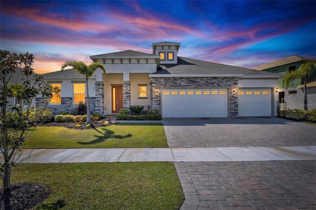 914 Signet Drive Apollo Beach, FL 33572 - Photo 60 of 100 a front view of a house with a yard