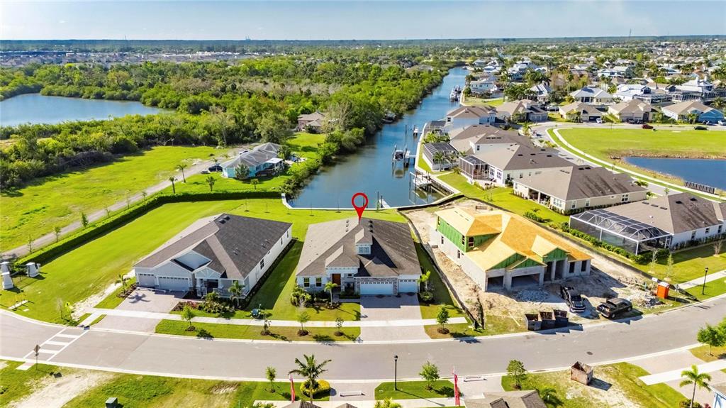 914 Signet Drive Apollo Beach, FL 33572 - Photo 6 of 100 an aerial view of residential houses with outdoor space and swimming pool