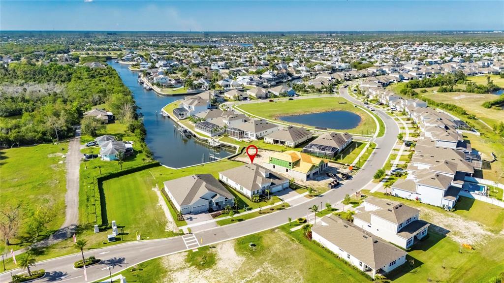 914 Signet Drive Apollo Beach, FL 33572 - Photo 67 of 100 an aerial view of residential houses with outdoor space