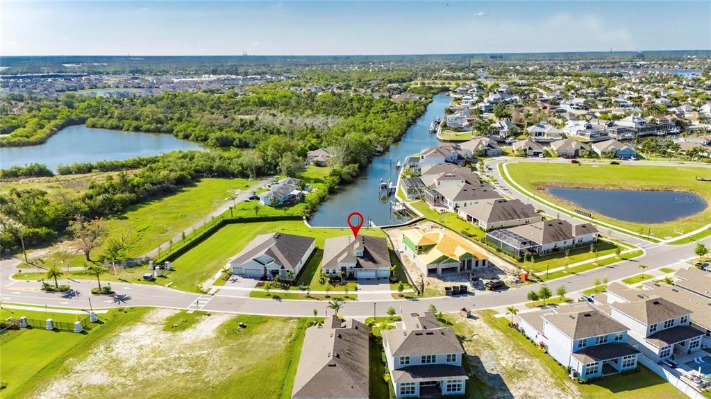 914 Signet Drive Apollo Beach, FL 33572 - Photo 68 of 100 an aerial view of residential houses with outdoor space