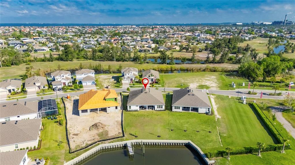 914 Signet Drive Apollo Beach, FL 33572 - Photo 73 of 100 an aerial view of a house with a pool yard and outdoor seating