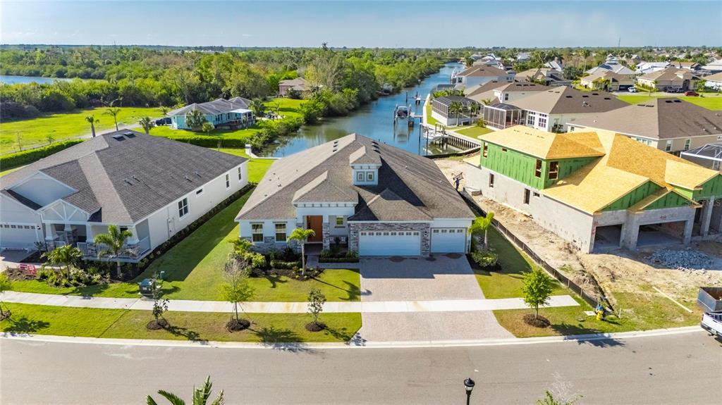 914 Signet Drive Apollo Beach, FL 33572 - Photo 78 of 100 an aerial view of a house with a big yard