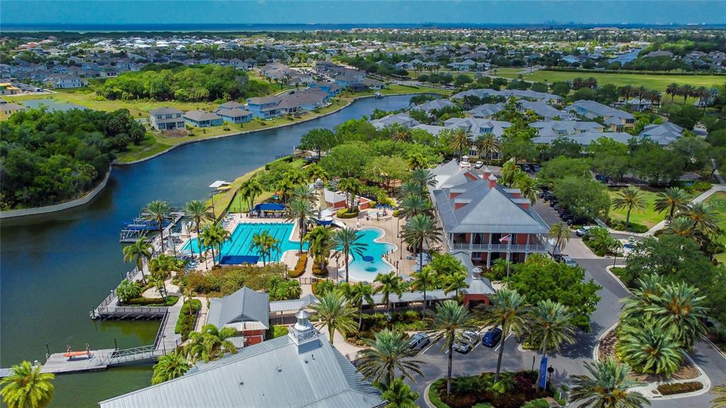 914 Signet Drive Apollo Beach, FL 33572 - Photo 92 of 100 an aerial view of house with yard swimming pool and outdoor seating