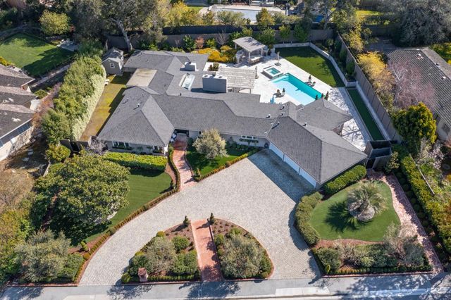 a view of a house with sitting area and furniture