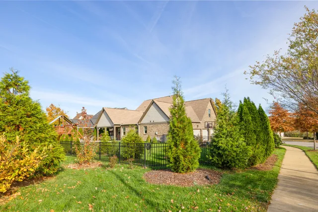 a view of a swimming pool with a yard