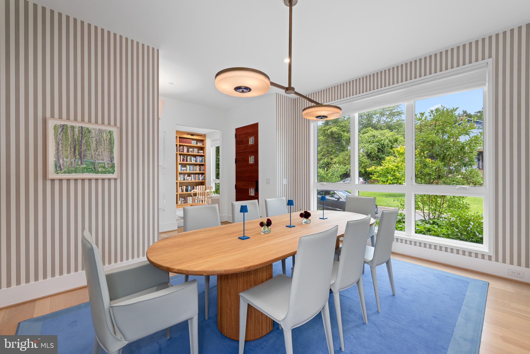 5624 Sherier Place Northwest Washington, DC 20016 - Photo 20 of 60 a view of a dining room with furniture window and wooden floor