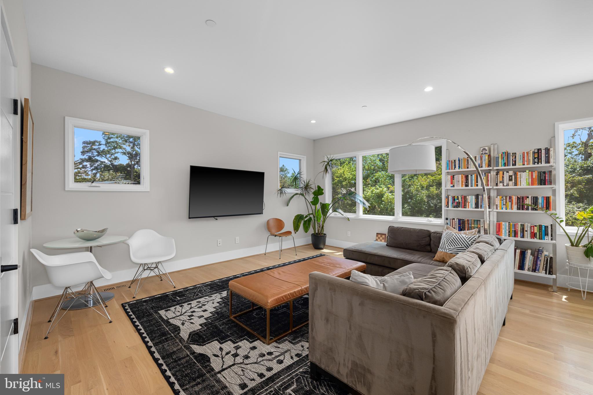 5624 Sherier Place Northwest Washington, DC 20016 - Photo 43 of 60 a living room with furniture and a flat screen tv