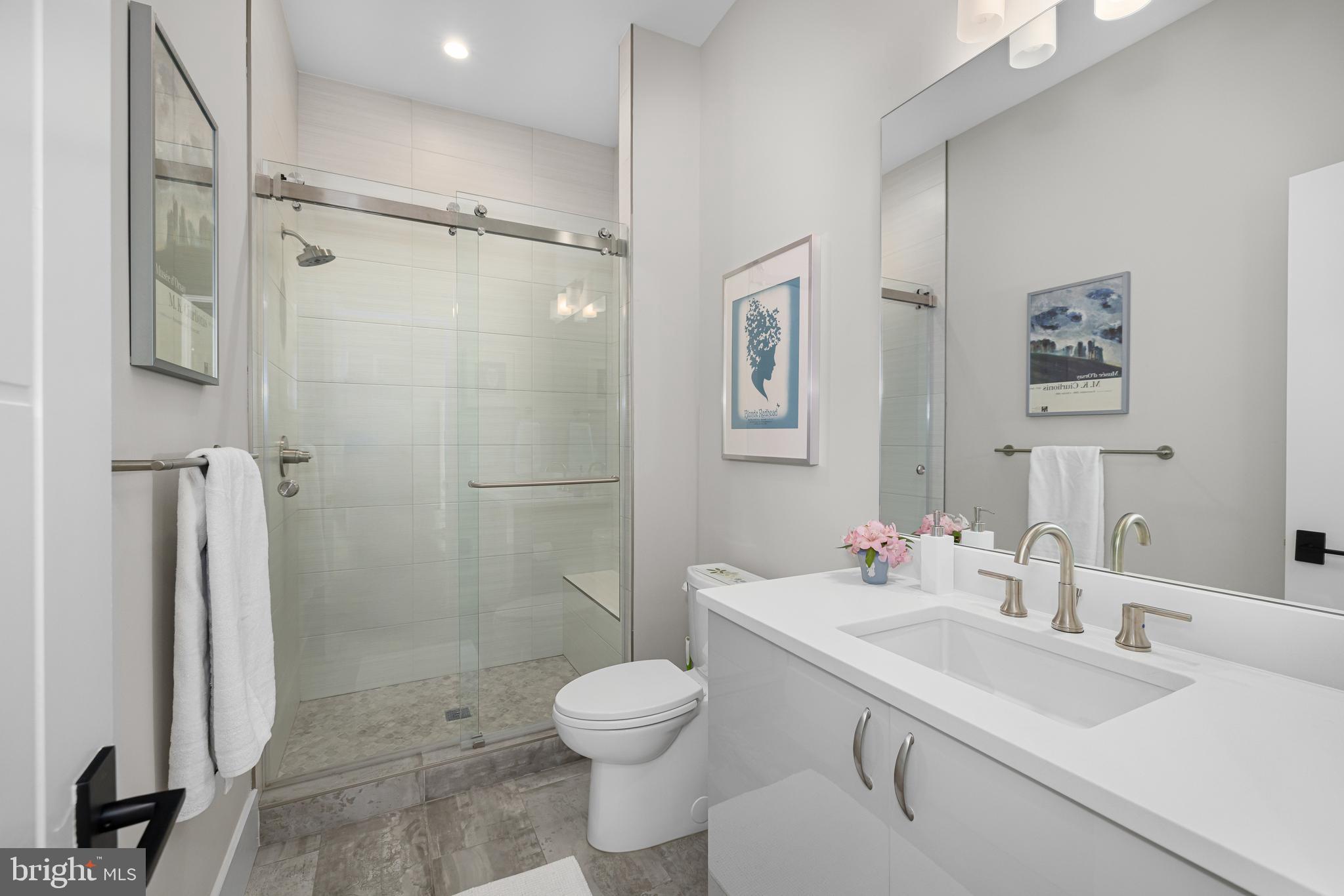 5624 Sherier Place Northwest Washington, DC 20016 - Photo 53 of 60 a bathroom with a sink toilet and shower