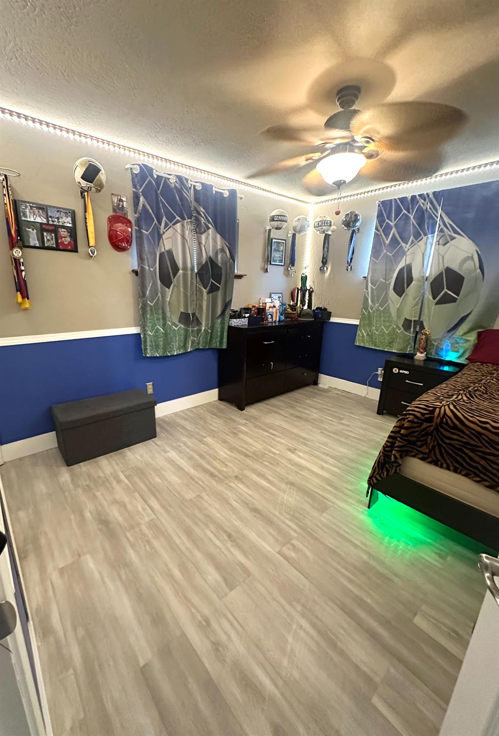 2313 Thomas Street Ceres, CA 95307 - Photo 31 of 35 a bedroom with a bed and a wooden floor