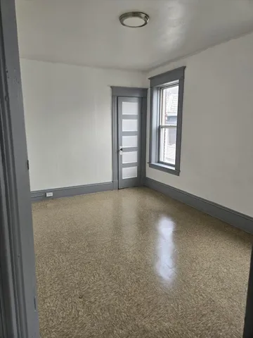 an empty room with a window