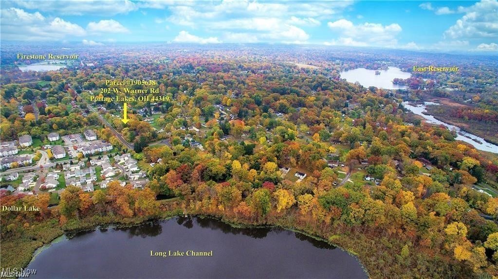 West Warner Road Akron, OH 44319 - Photo 6 of 6 Aerial view of property and surrounding area with a forest and a large body of water