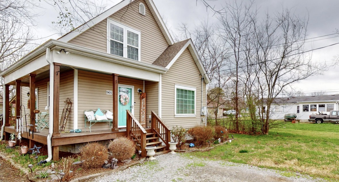 901 Hickory Ridge Road Lebanon, TN 37087 - Photo 42 of 43 a front view of a house with a yard outdoor seating and covered with snow