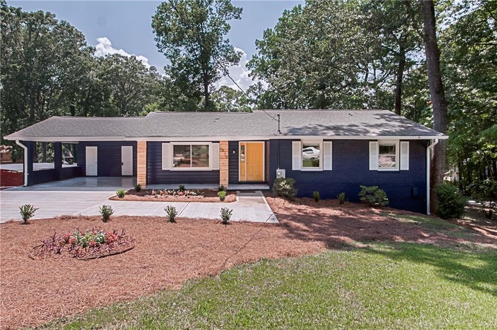 2535 Dawn Drive Decatur, GA 30032 - Photo 1 of 1 a view of a house with a yard and sitting area