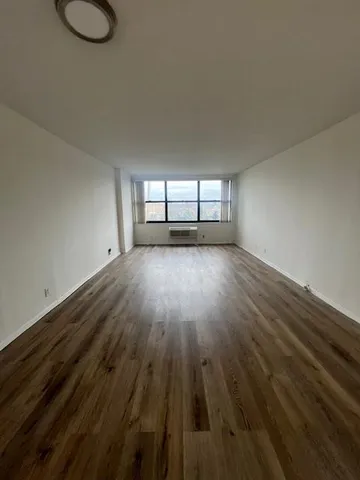 a view of a city with tall buildings