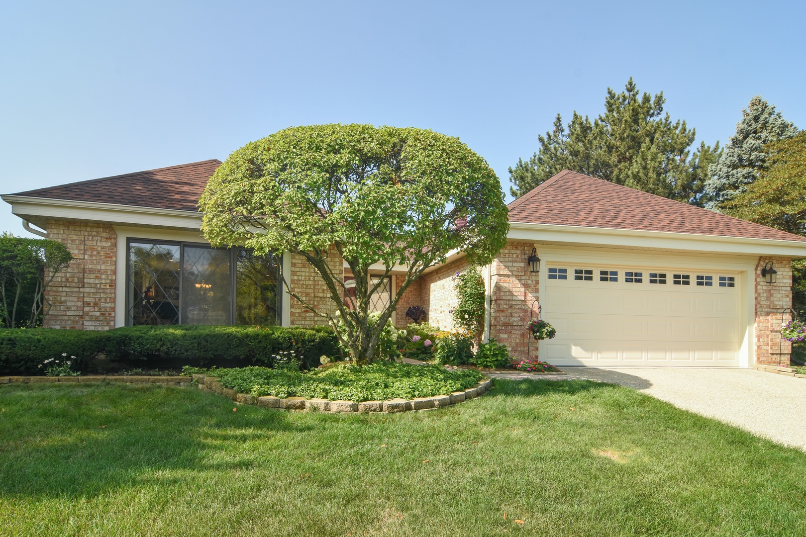 2305 Greenwood Road Northbrook, IL 60062 - Photo 1 of 25 a front view of a house with garden