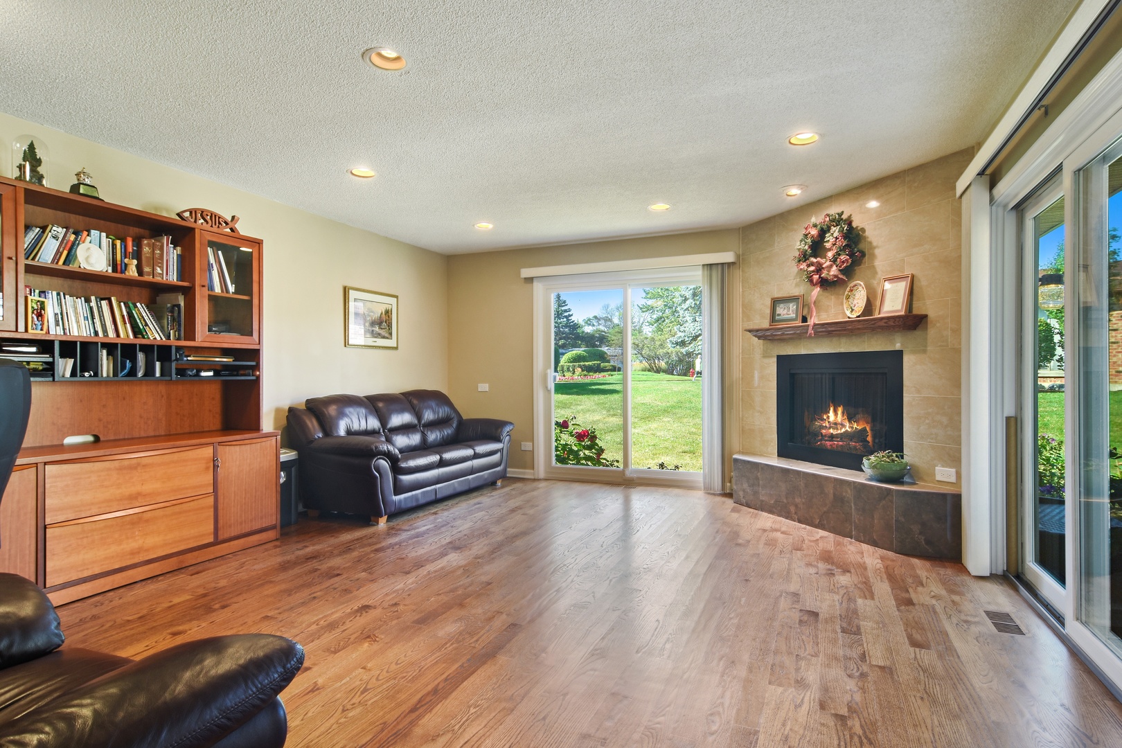 2305 Greenwood Road Northbrook, IL 60062 - Photo 14 of 25 a living room with furniture and a fireplace