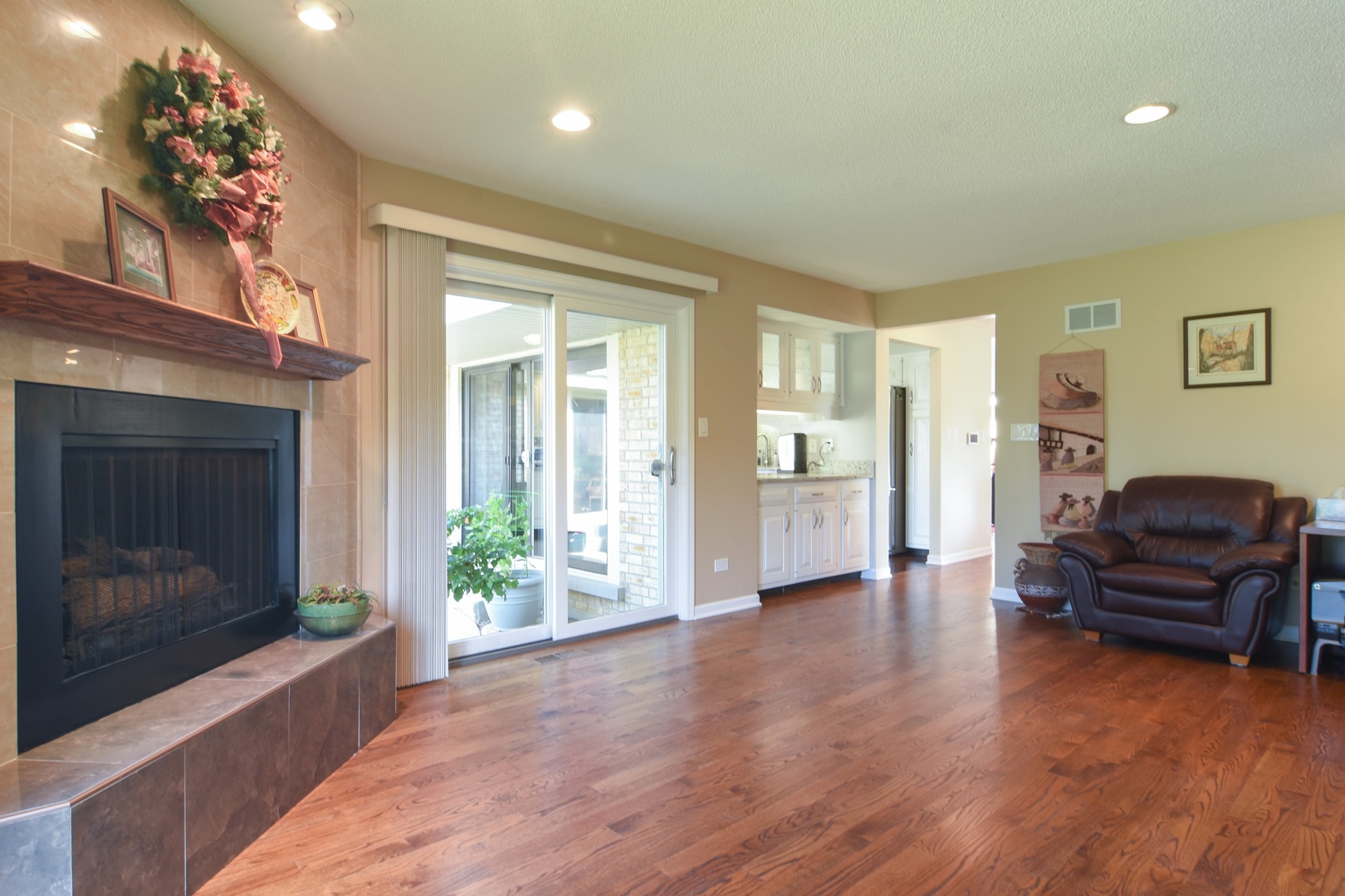 2305 Greenwood Road Northbrook, IL 60062 - Photo 15 of 25 a living room with furniture and a fireplace