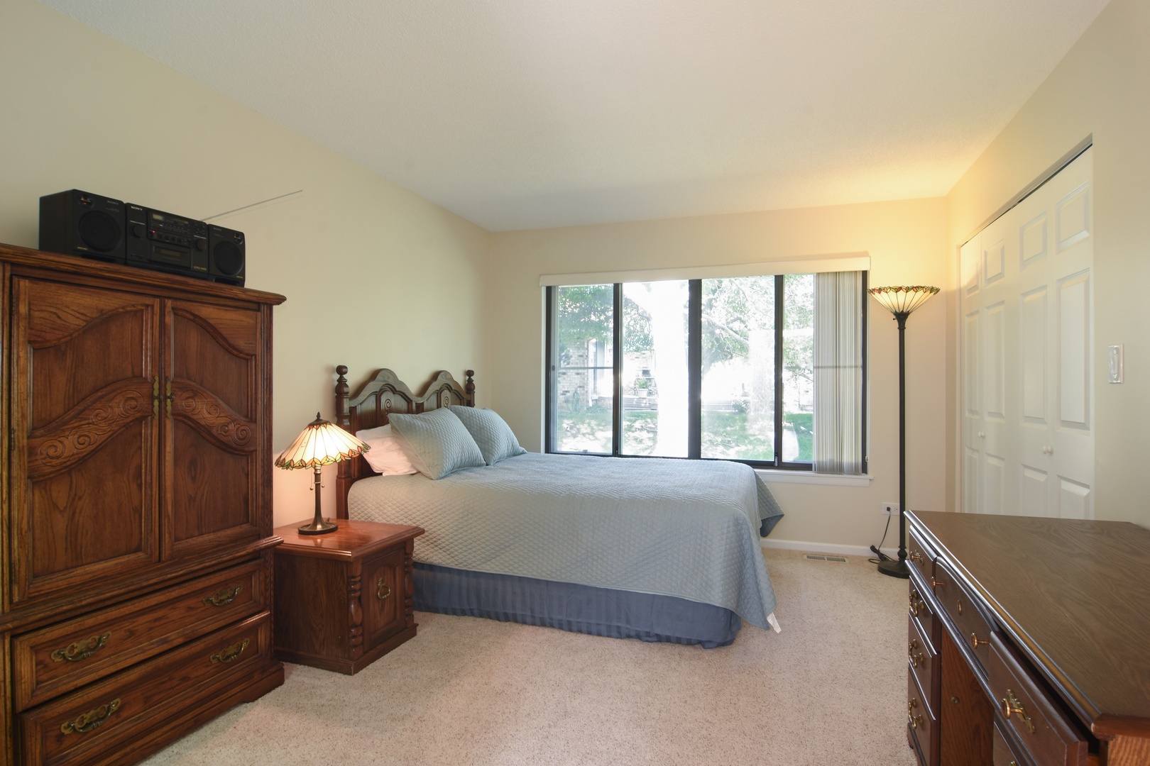 2305 Greenwood Road Northbrook, IL 60062 - Photo 21 of 25 a bedroom with a bed and window